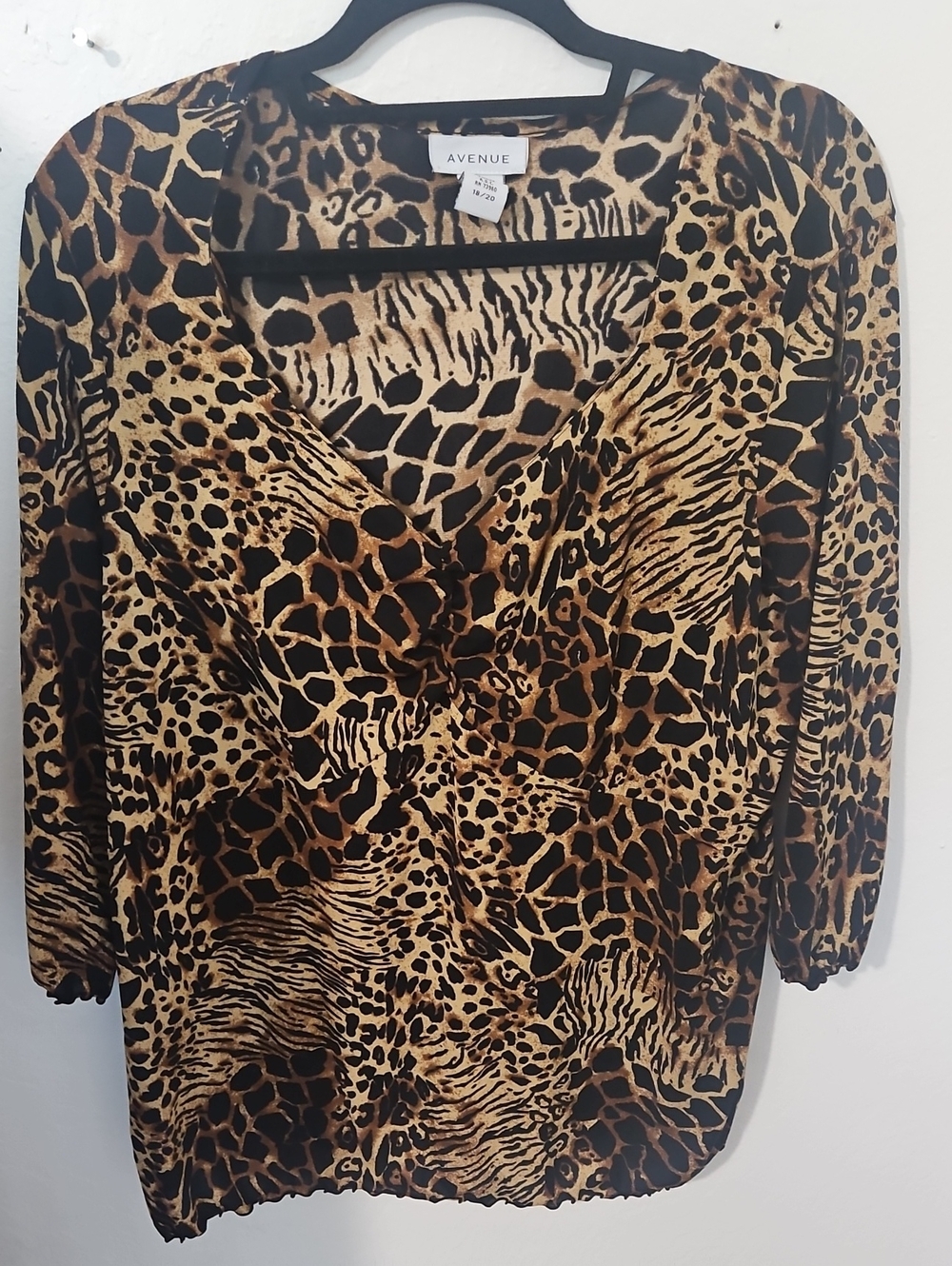 Avenue Animal Print V-Neck Blouse in Brown and Black